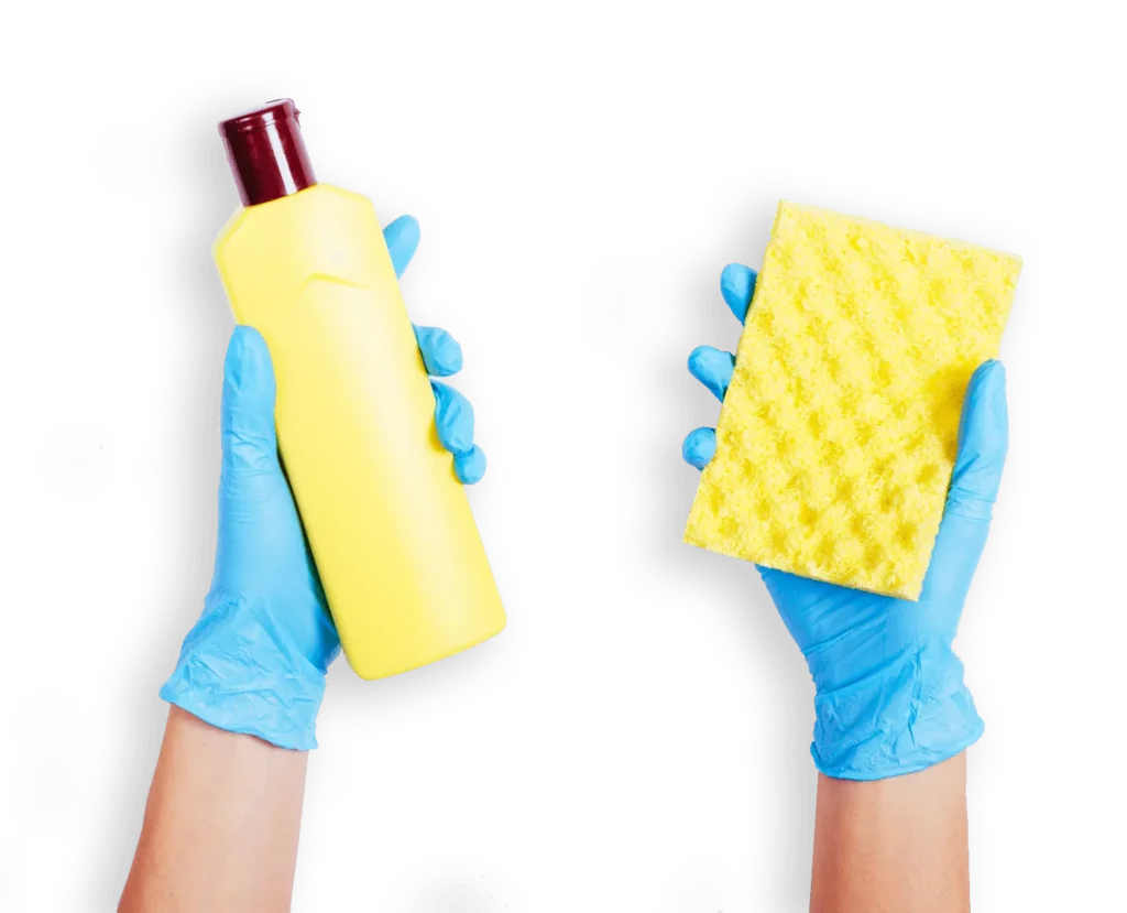 Hands holding cleaning supplies